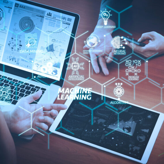 Machine learning technology diagram with artificial intelligence (AI),neural network,automation,data mining in VR screen.two colleagues discussing data with new modern computer laptop and pro digital tablet.