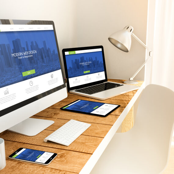 Digital generated devices over a wooden table with fresh and modern responsive design website. 3d rendering. All screen graphics are made up.